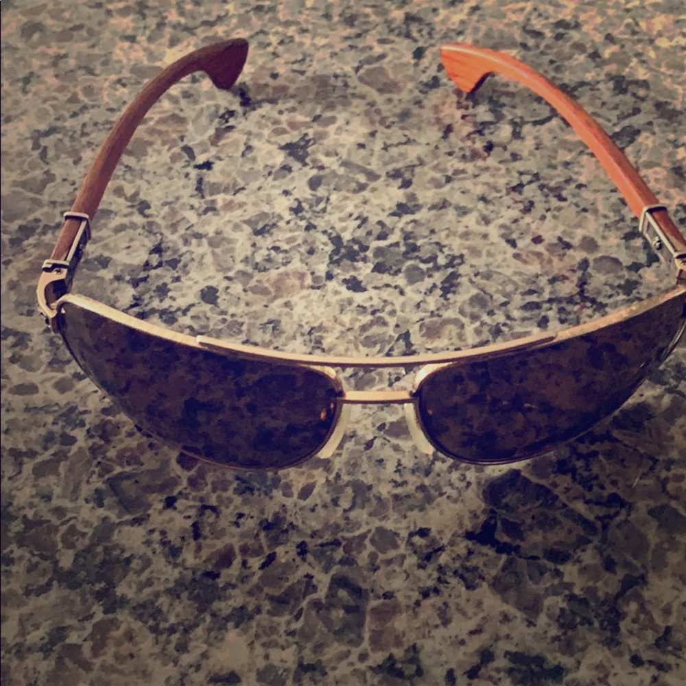 Chrome hearts beast one wooden  with gold frames.